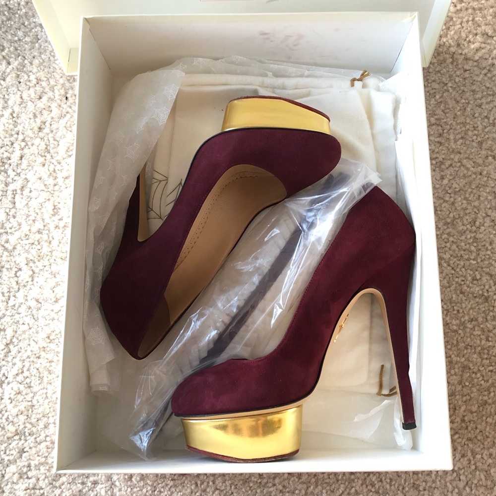 Charlotte Olympia Dolly with ruffled anklet.